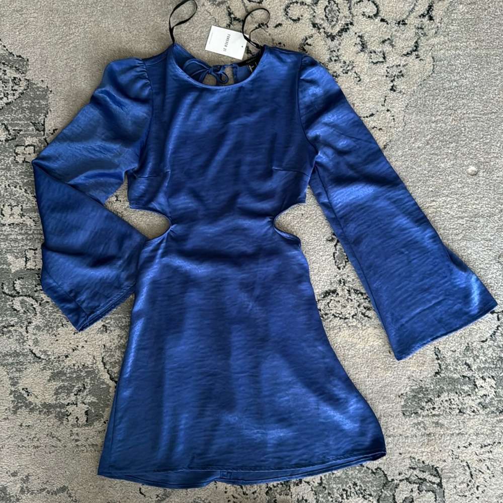 Bell-sleeve mini with open back and cutouts